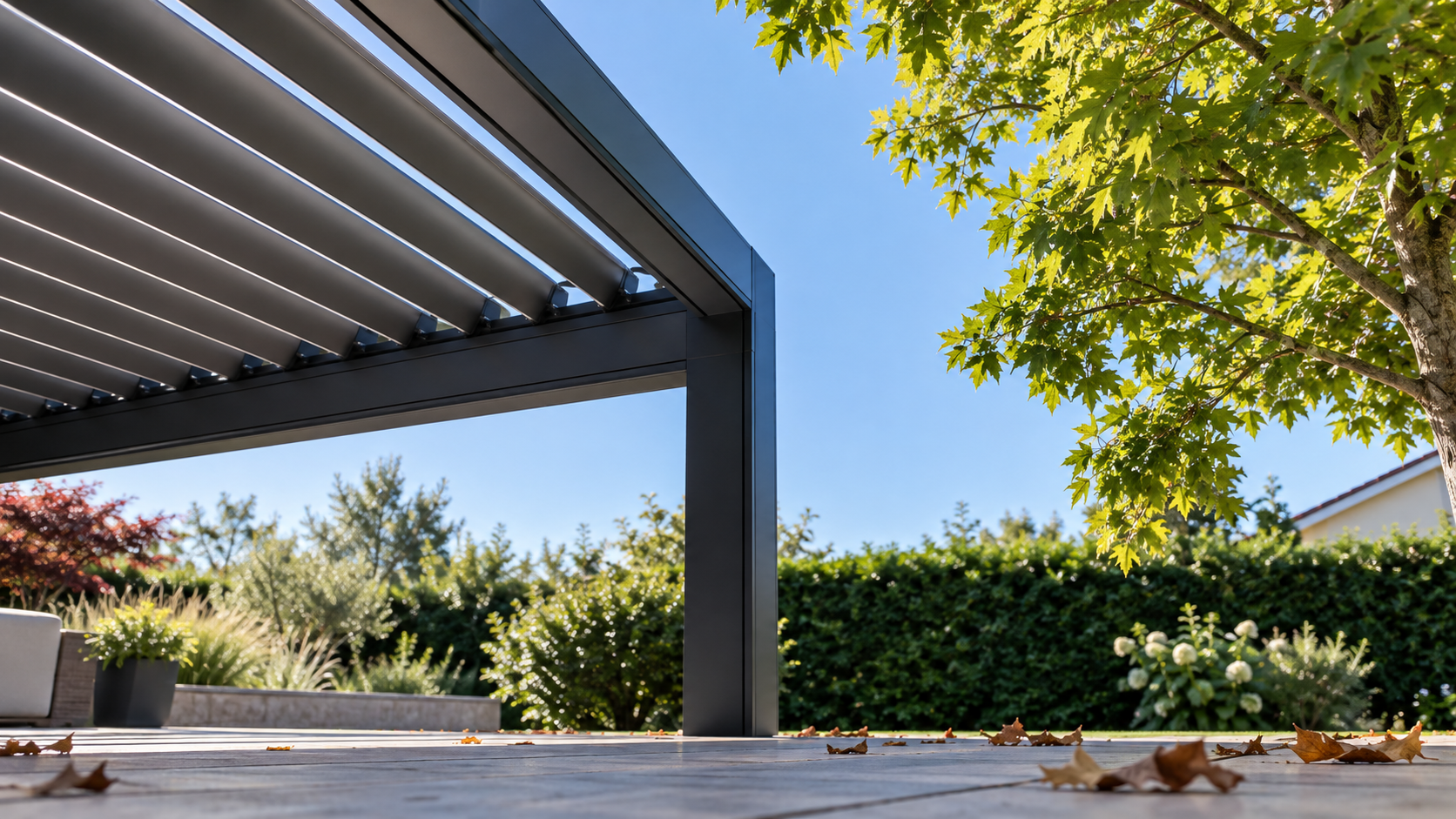 Open space between a generic louvered roof edge and nearby tree branches. Concept visualization · Not a customer installation